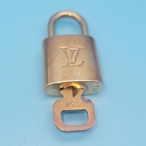 Louis Vuitton Gold Padlock with Key